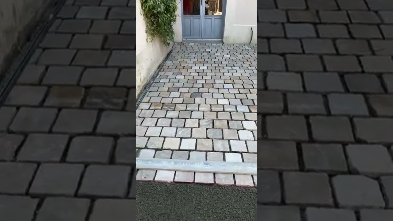 Pavée en grès multicolore pose sur béton armé