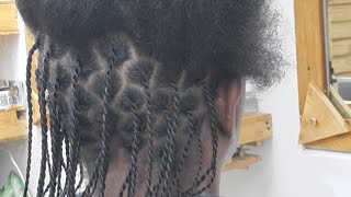 Tight two strand twist on natural hair