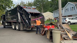 Garbage Truck Packing A Big Bulk Pile