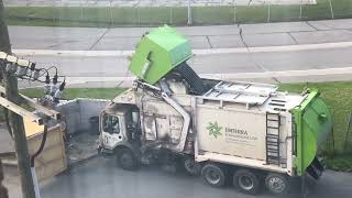 Emterra Garbage Truck picking trash in Michigan