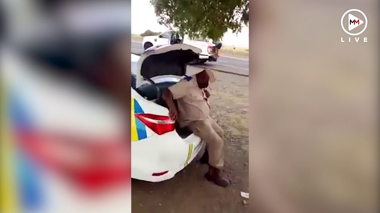 Traffic cop caught napping on duty - YouTube