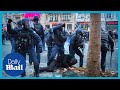 France protests french riot police attack protesters with batons amid pension reform announcement
