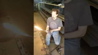How to remove a rusted bolt by heating it with a torch.