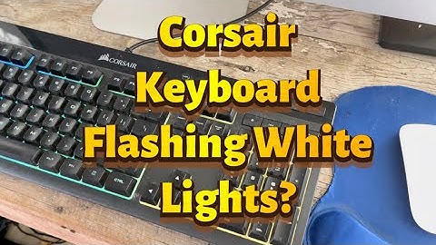 How do I stop my Corsair keyboard from flashing white lights?