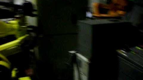 Used indutrial robot FANUC Arcmate 100i w/ control Rj2 and 7th axis positioner @ www.eurobots.net