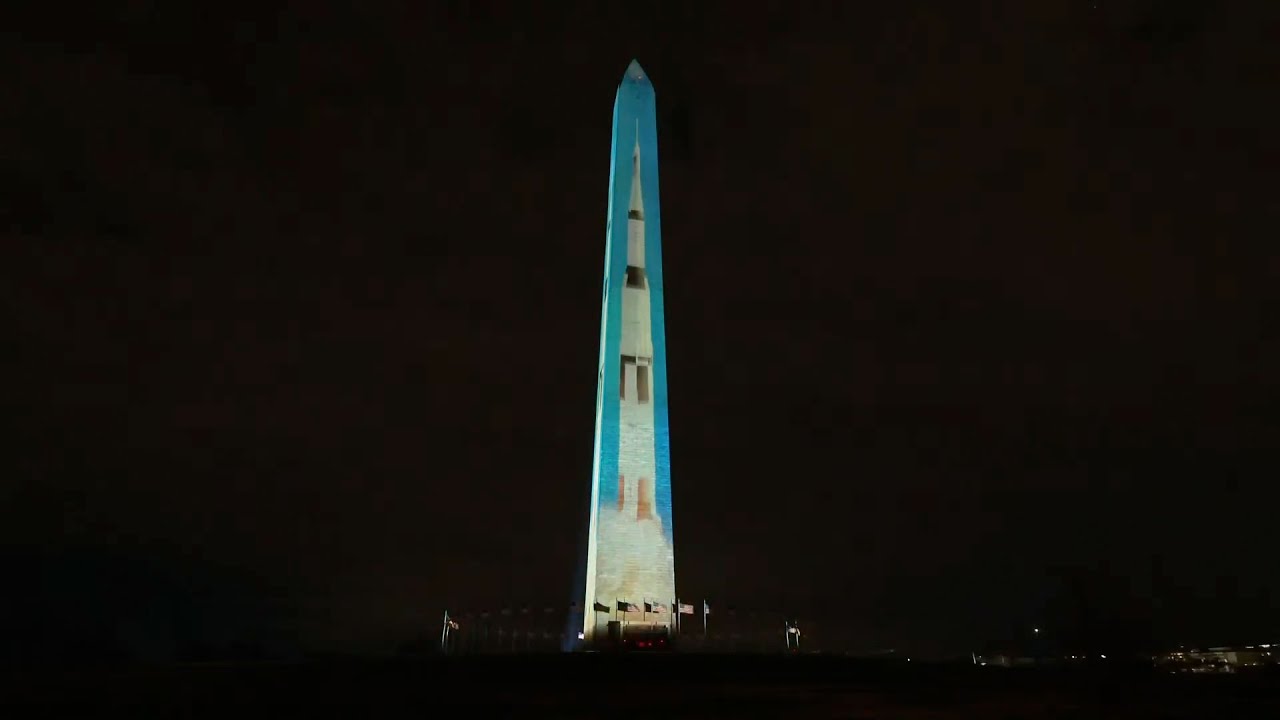 NASA moon rockets projected full size onto Washington Monument for