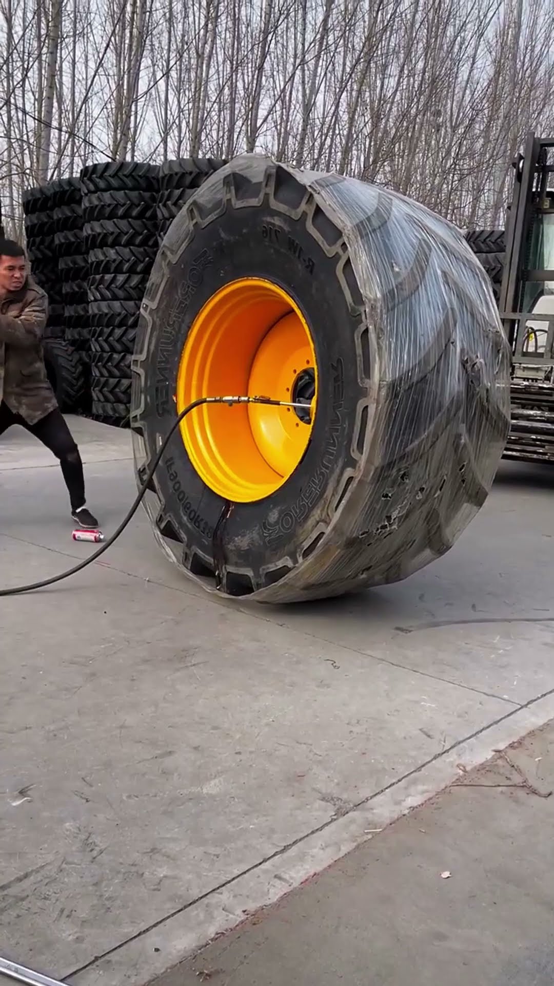 Tractor tire installation process- Good tools and machinery make work easy
