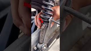 Adjustment process of spring for electric motorcycle shock absorber