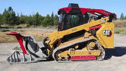 Jak velký je pásový traktor Cat 299?