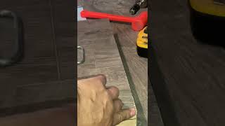 Cutting a hole in fresh laid floor.