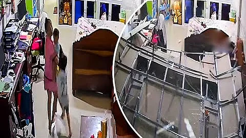 Mom runs back and saves her baby seconds before ceiling collapses above them in daring video
