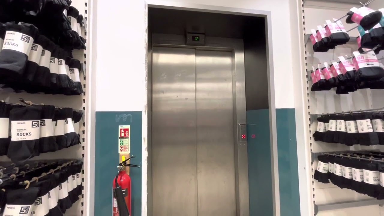 (47) Customer elevator at Poundland Above Bar, UK