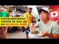 Um japonês experimentando comida de rua em Belém do Pará