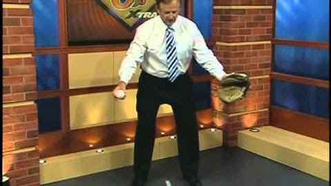Rick Dempsey demonstrates how to throw down to second base