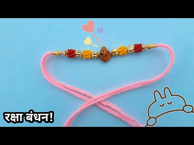 Beautiful Ganeshji Golden Rakhi with Rudraksh | Send Rakhi Gifts Online -  Babla Rakhi