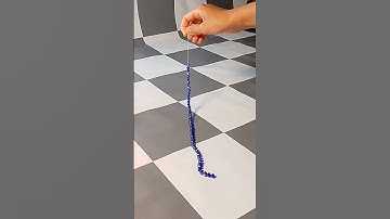 Unwinding the mystery! beads on a string in reverse #ytshorts #unique #strings #reversed