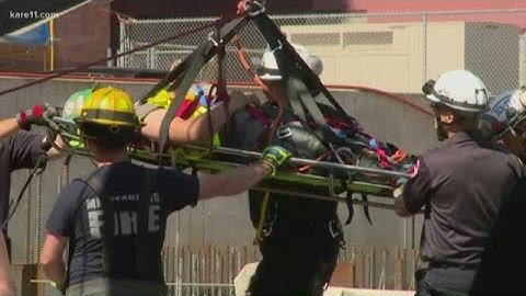Construction worker rescued after being trapped in trench