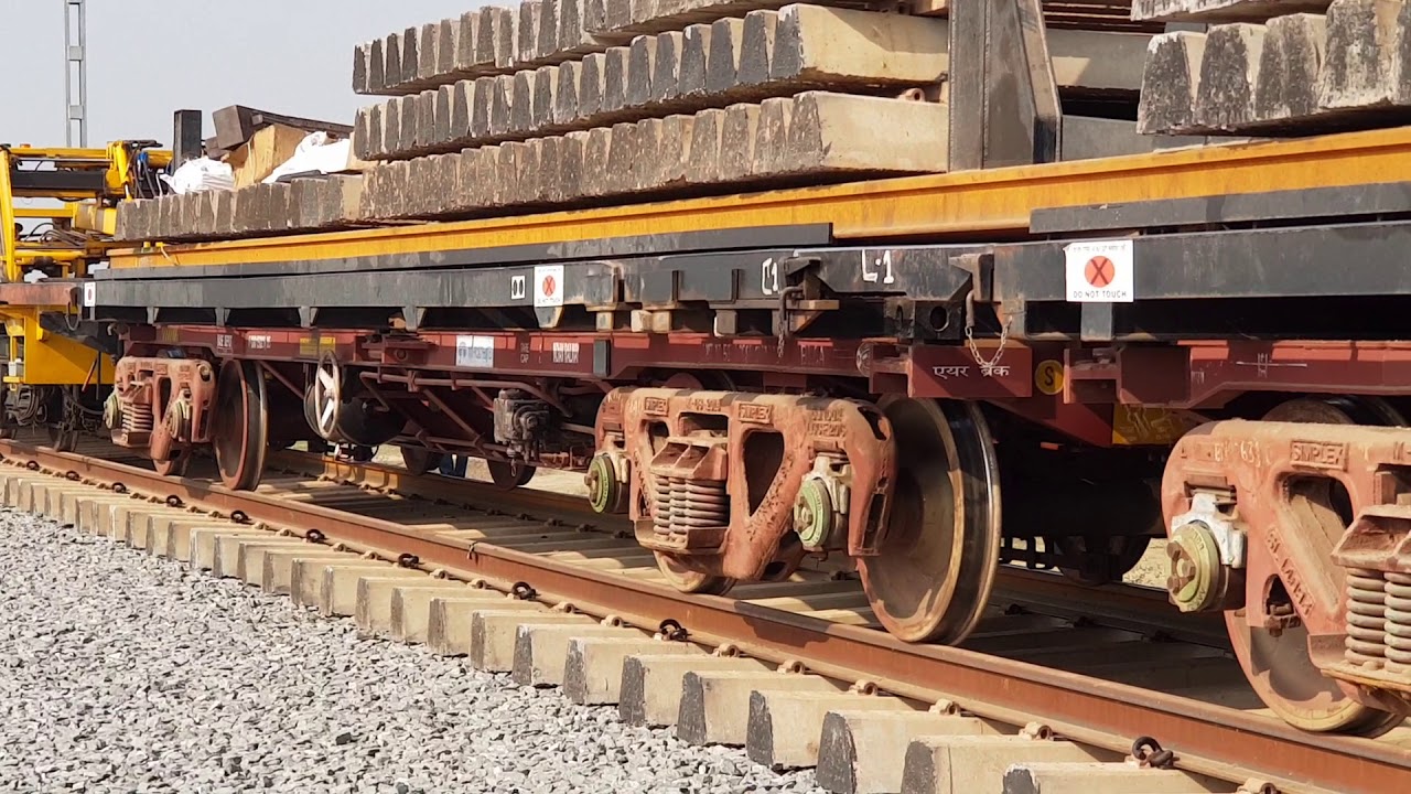 New Track Construction (NTC) machine lays 1.5 km of track per day in DFC News Station YouTube