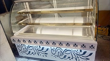 sweet display counter..Corian design ,band glass