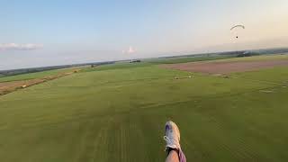 Paramotor solo landing with an instructor talking you down for a perfect landing