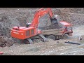 Hitachi Zaxis 870 LCH excavator loading blasted rock (part 2)