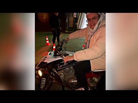 Отец с сыном на квадроцикле