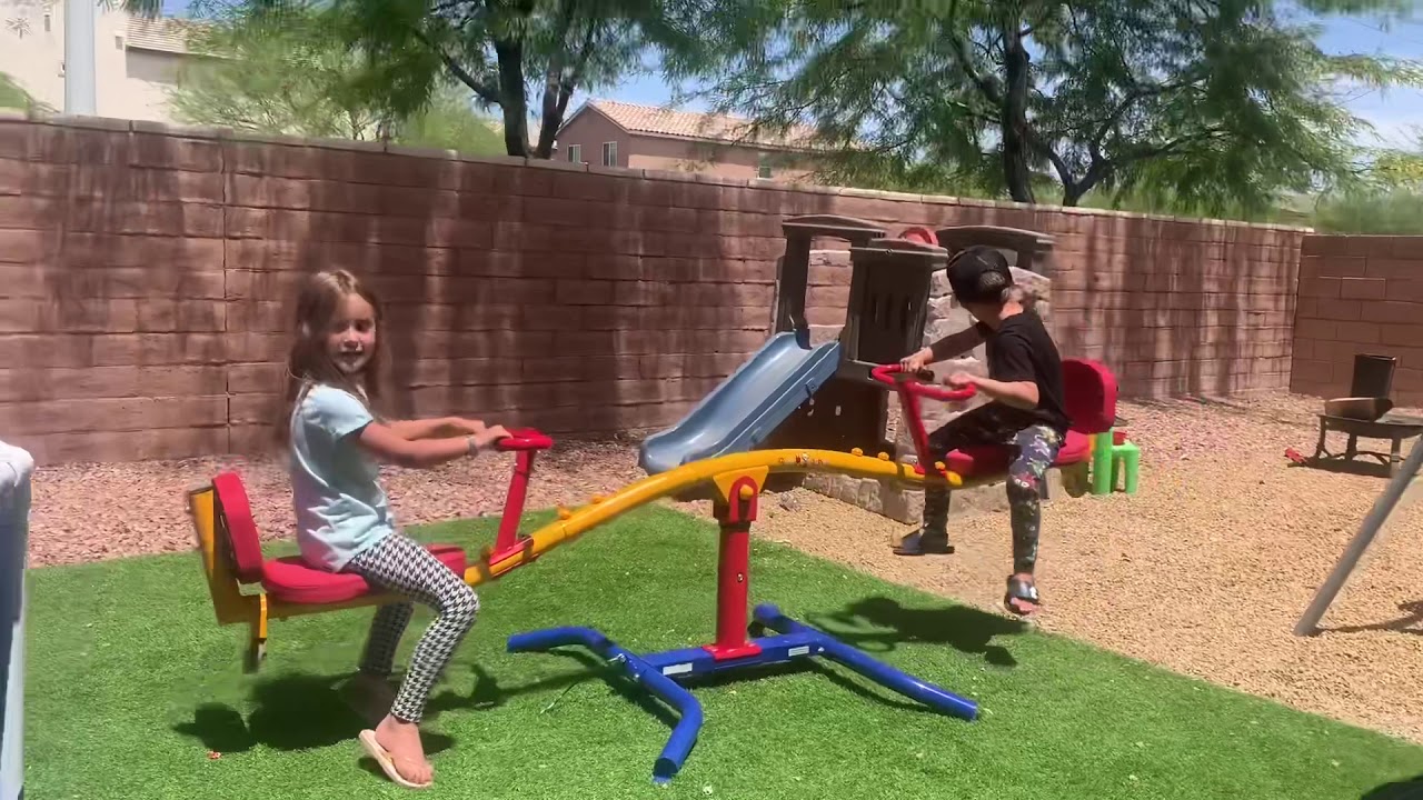 Kenna and Knox enjoy their new 360 teeter totter