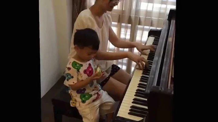 Sean sings song with his Mom 1y11m7d