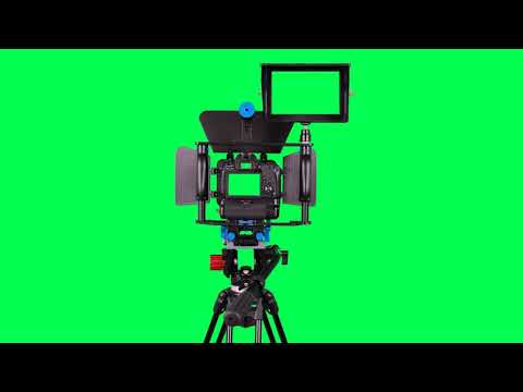 Dslr camera with green screen for video shooting on the tripod with green screen - free use @bestgreenscreen