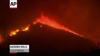 (9 nov 2018) driven by santa ana winds, wildfires that are sweeping
across southern california moved into agoura hills northwest of los
angeles friday mornin...