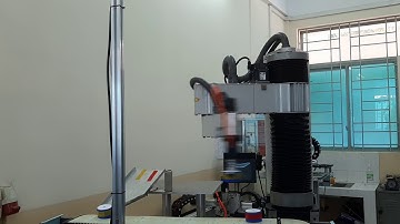 SCARA Robot + Vision System for positioning control and barcode reading
