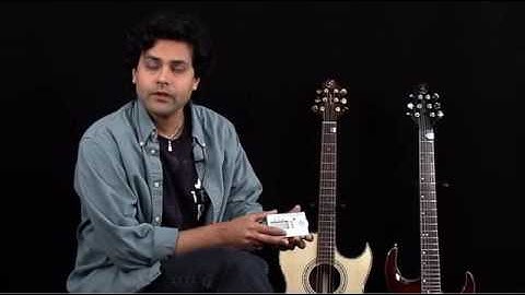 Guitar Lessons for Beginners - How to Play 1000 Songs - Day #1: Tuning the Guitar