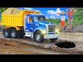 Bruder Dump Truck Mack stuck on a bridge - Children fixed the bridge