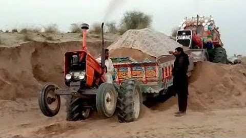 Mf 385 tractor performance   with front blade loading trolley and Mf 375 pulling trolley 2022