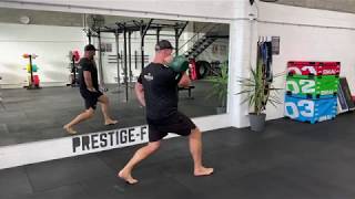 Kettlebell Single Arm Front Rack Walking Lunge demonstration