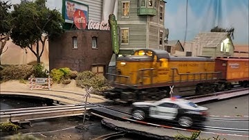 Lionel & Slot Cars Xing - 3 rail Tube Track with "Carrera Go" Slot Cars Railroad Crossing