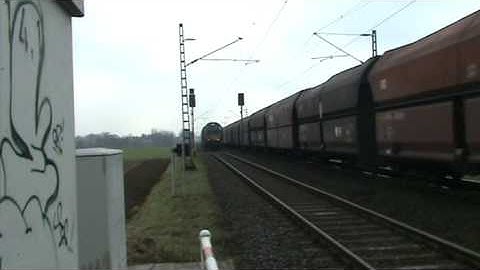 DB Schenker-Railion train meets engine light power move HGK at Breyel,Germany March 1,2009