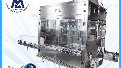 engine oil filling machine: One Minute To Show You How Machine Fill engine oil into the barrel.