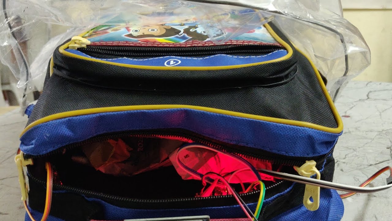 Smart Bag Using Arduino Rain Protection System for Bags Using Servo Motors and Arduino UNO ...