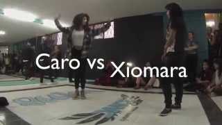 BATTLE CAROLINA VS. XIOMARA
