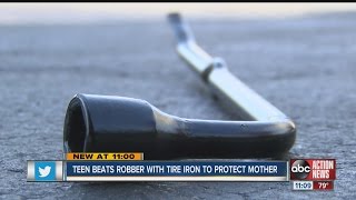Teen hits armed robber with tire iron, body slams him in order to protect family
