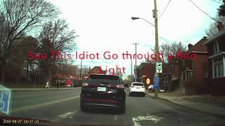 Ford SUV going through red light.