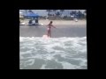 Kyleigh surfing at cocoa beach Florida age 8