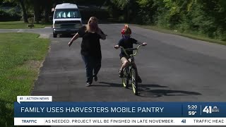 Family uses Harvesters mobile pantry