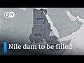Ethiopia starts filling disputed River Nile dam | DW News