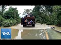 Flood-Hit Malaysian Villagers Evacuated Via Bulldozers