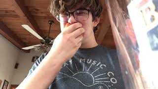 52 seconds of a kid eating a tomato like a apple