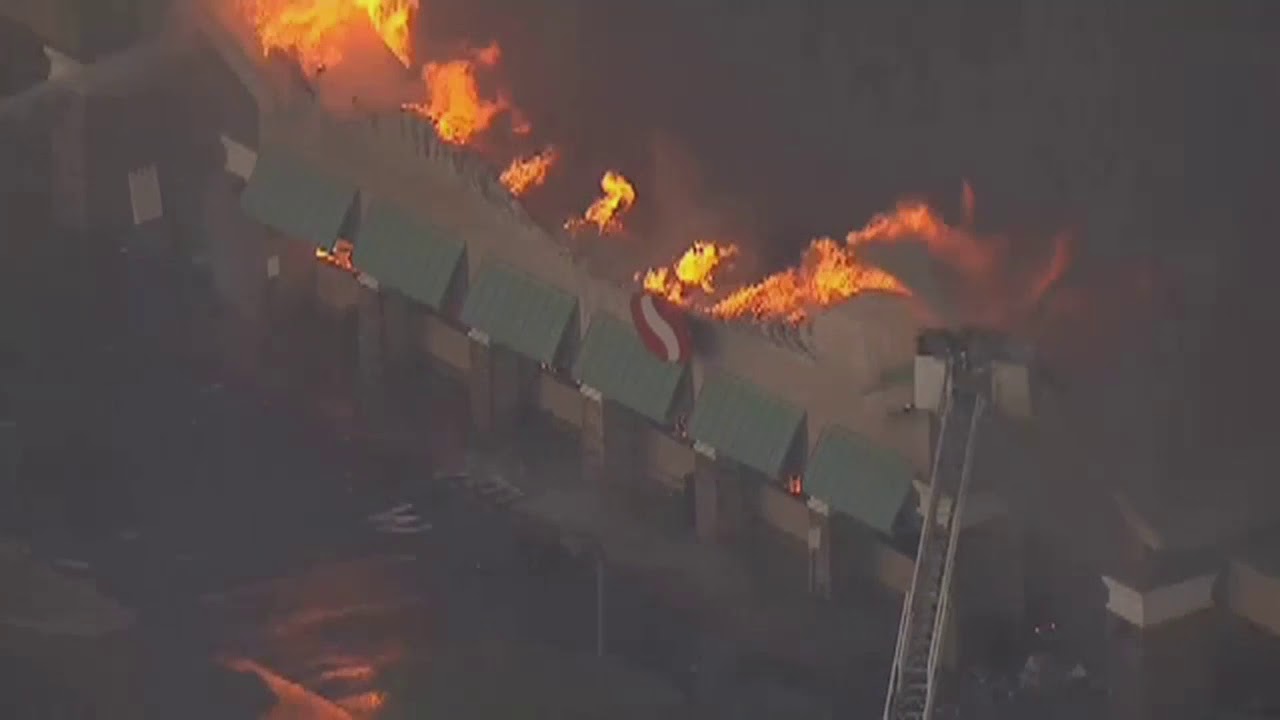 RAW VIDEO: Safeway sign collapses during massive fire at west Phoenix store