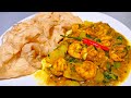 Curry shrimp  aloo with paratha bussupshut roti