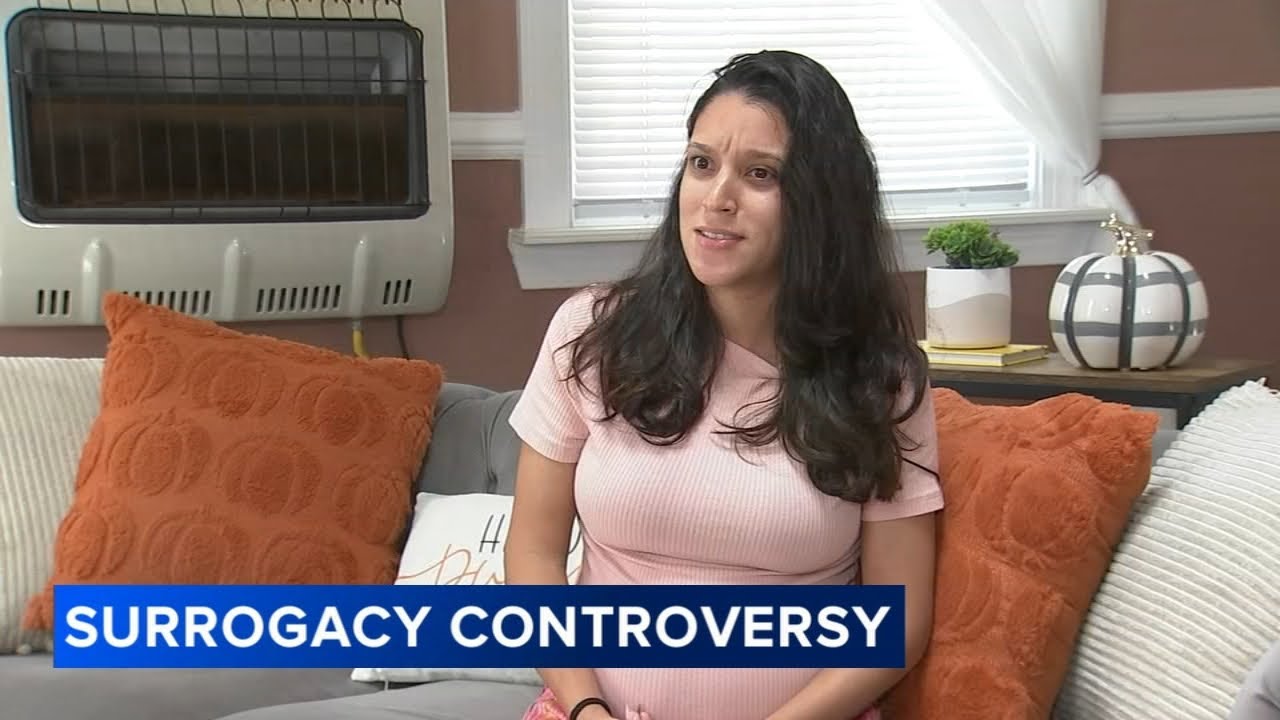 Catholic school teacher placed on leave over surrogacy - YouTube